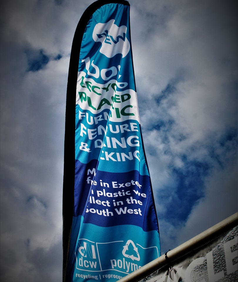 Design and print of outdoor banner for Devon Contract Waste by flag printing experts Nettl of Exeter.
