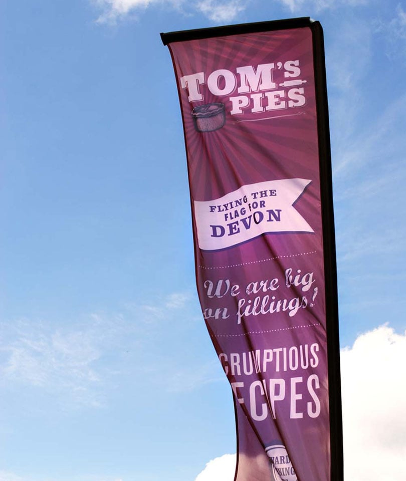 Large outdoor banner designed and printed at Nettl of Exeter.