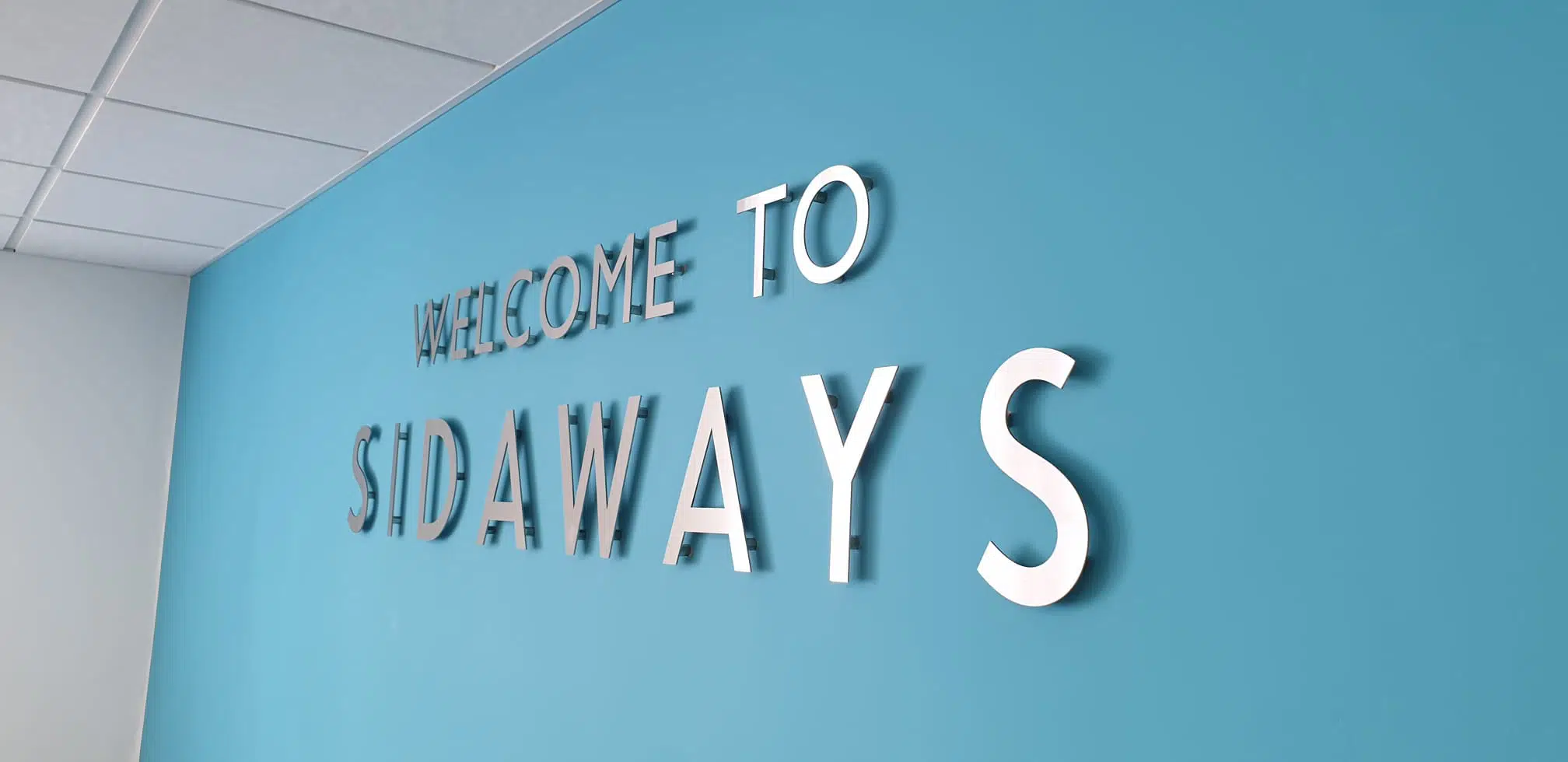3D Raised Metal internal office sign for Sidaways by Nettl of Exeter