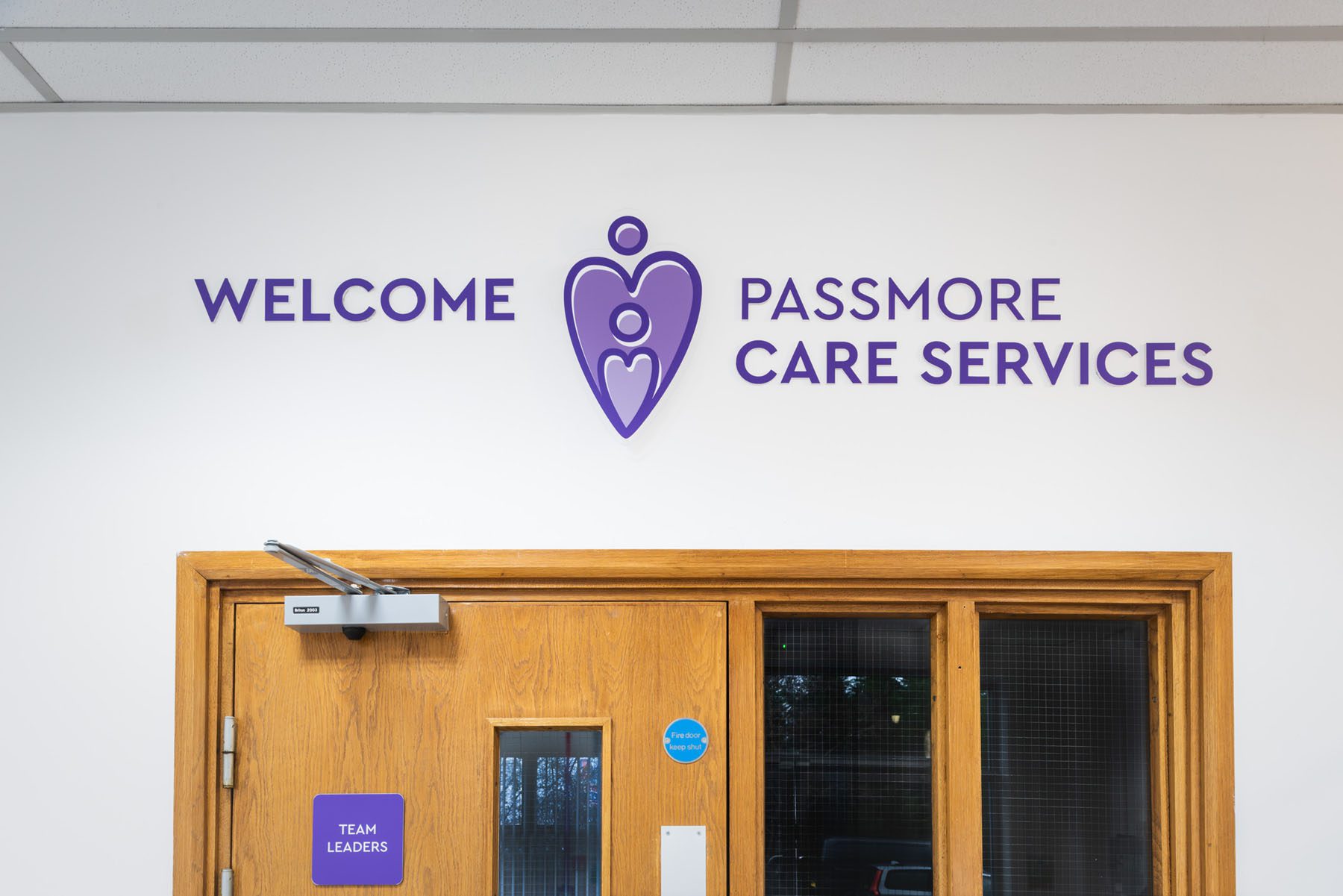 Passmore Care Reception Sign