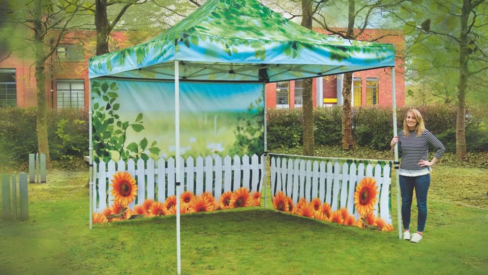 Example of a full-colour printed gazebo with one wall and one side by Nettl of Exeter.