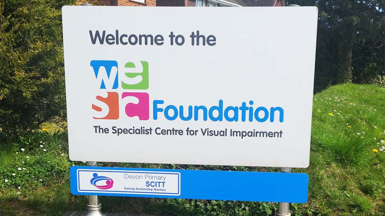 School sign designed, created and installed by the magical team at Nettl of Exeter.