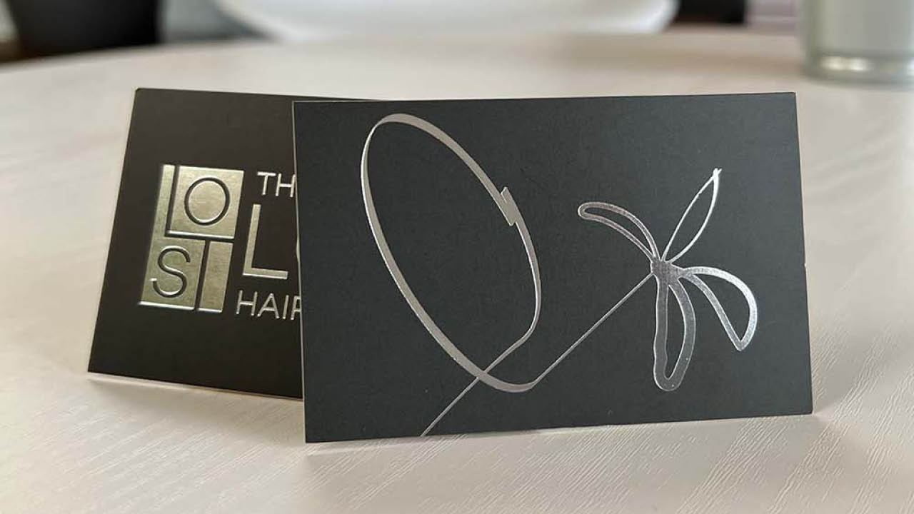 Nettl of Exeter design and print silver-foil business cards.