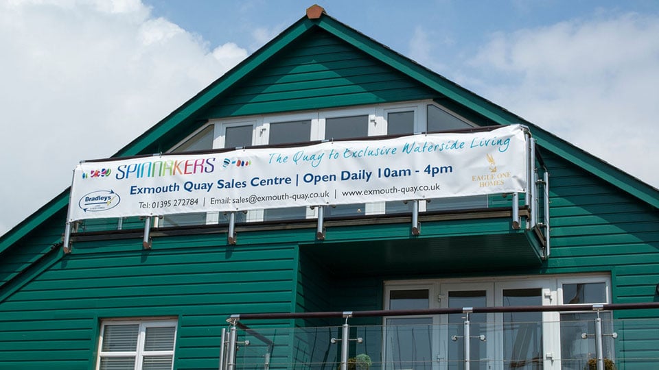 Large-scale PVC banner print and fit by the Nettl of Exeter team.