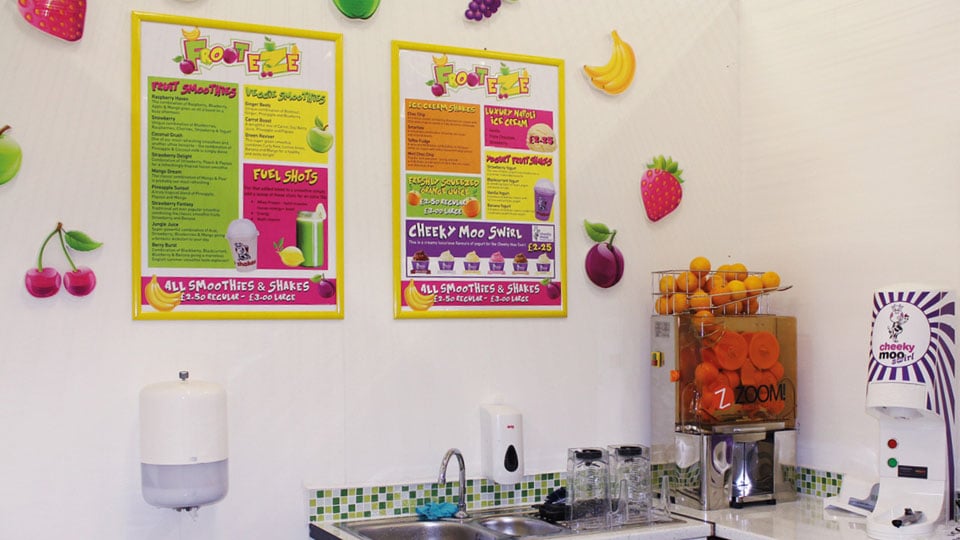 Large format indoor posters for Froot Eze by Nettl of Exeter. Bright and colourful prints against a white wall.
