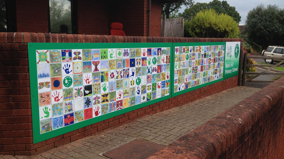 Large format exterior signage fit at West Hill Primary School in Exeter Devon.